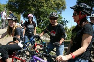 A pack of female mountain bikers await their turn to compete at the Santa Cruz Mountain Bike Festival in Aptos last year. This is the first year the festival will offer a women's-only competition on the jumps. (Karen Kefauver/contributed)