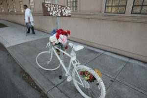 A "ghost bike" marks the spot where a cyclist was killed near Oakland. The Santa Cruz cycling community is considering placing such a memorial along Highway 1 for Josh Alper, who was struck by a car and killed Saturday. (Doug Oakley/Bay Area News Group)