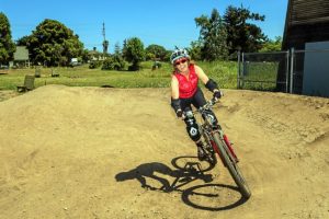 Karen Kefauver gets in some action at the Chanticleer Pump Track in Santa Cruz on Saturday. (Clayton Ryon -- Contributed)