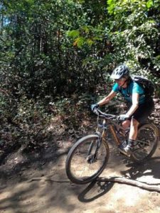 Santa Cruz's Jessica Klodnicki tackles a steep section of trail at Wilder Ranch recently on a women's group ride she organized. (Juliann Klein -- Contributed)
